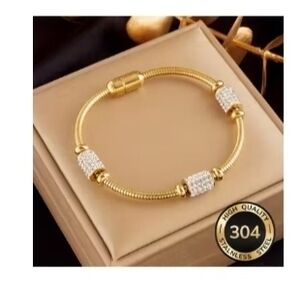 Luxurious Gold and Silver-Toned Bracelet